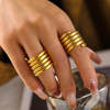 Cross-border European and American niche design multi-layer winding wide version ring for women with light luxury texture titanium steel plated 18k gold ring