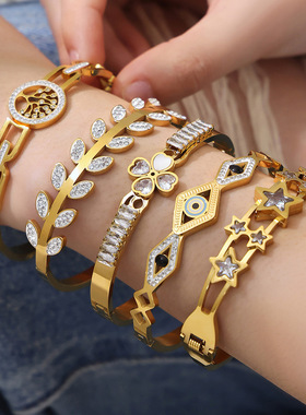 不锈钢恶魔之眼锆石开口手镯镀18