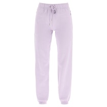 Honey Dijon grabbing a velvet slow running pants woman