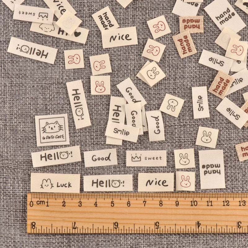 米色标签衣服服装领标手工制作折边布标DIY布贴服饰标签100个,淘宝优惠券,粉丝福利购,淘宝优惠卷