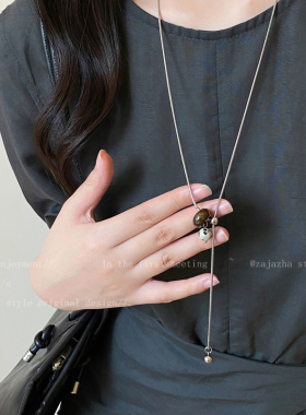 。复古虎眼石花朵爱心抽拉项链女2025新款爆款高级感小众长款毛衣