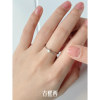 Moissanite is a simple layered design that can be worn multiple times and is gentle on the fingers.
