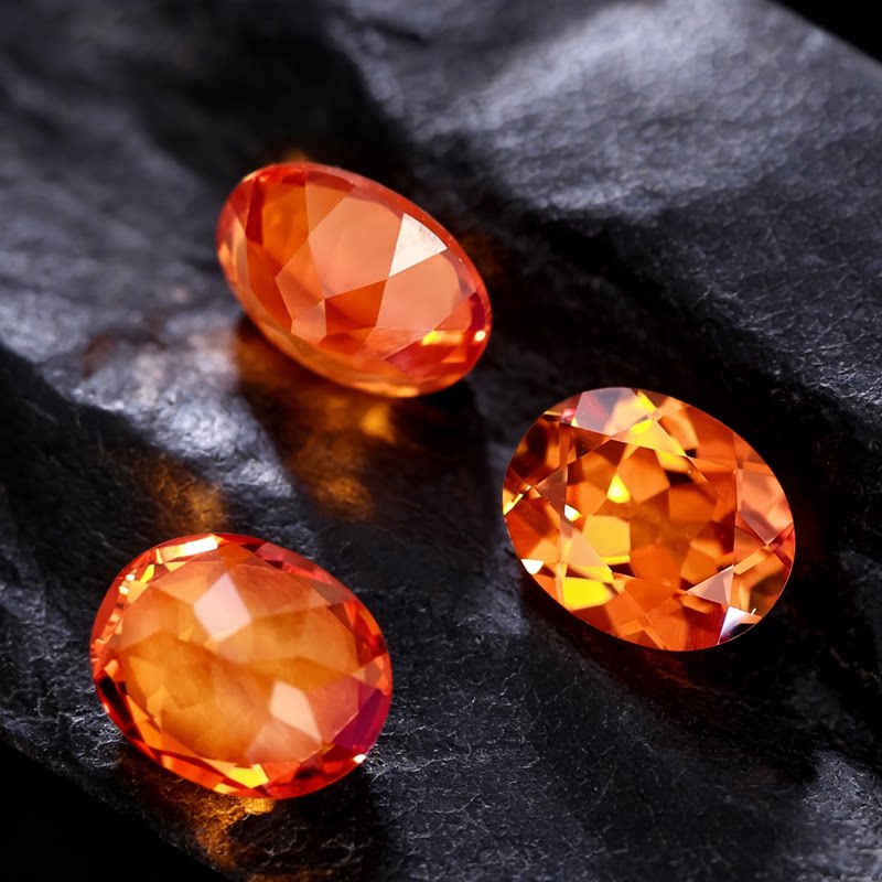 Orange blue bufanta color spessartite garnet African oval loose stone ring with loose diamonds on the ring surface