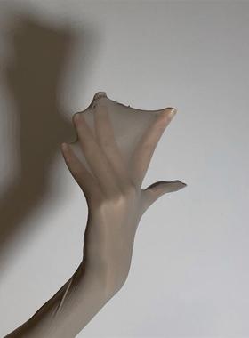 一对奇怪的用途与富有想象力的滑动性感丝袜和手套飞机手酿造和油