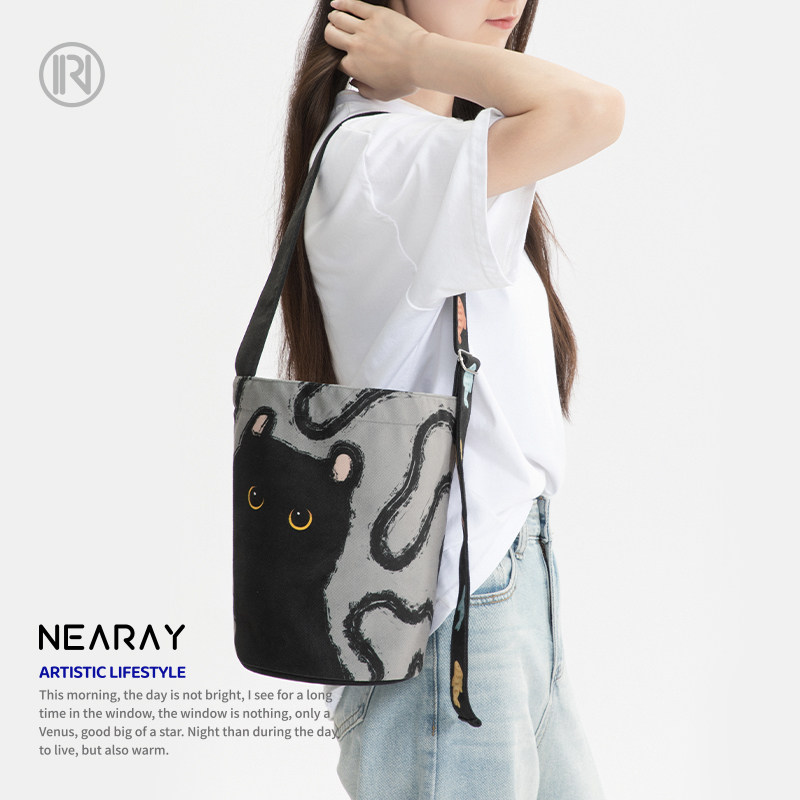 尼睿2025新款包包女可爱猫咪水桶包单肩包斜挎包手提小众通勤包Z6,淘宝优惠券,粉丝福利购,淘宝优惠卷