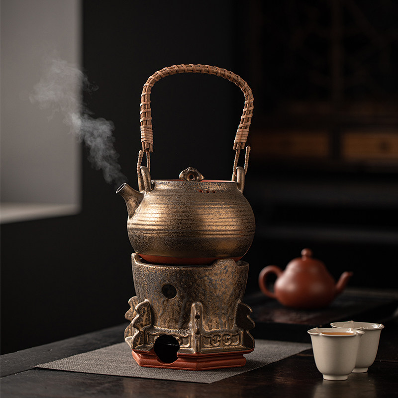 Tea stove, butter, household lifting kettle, clay pot, ancient method, open fire charcoal charcoal stove, outdoor camping, making tea around the stove
