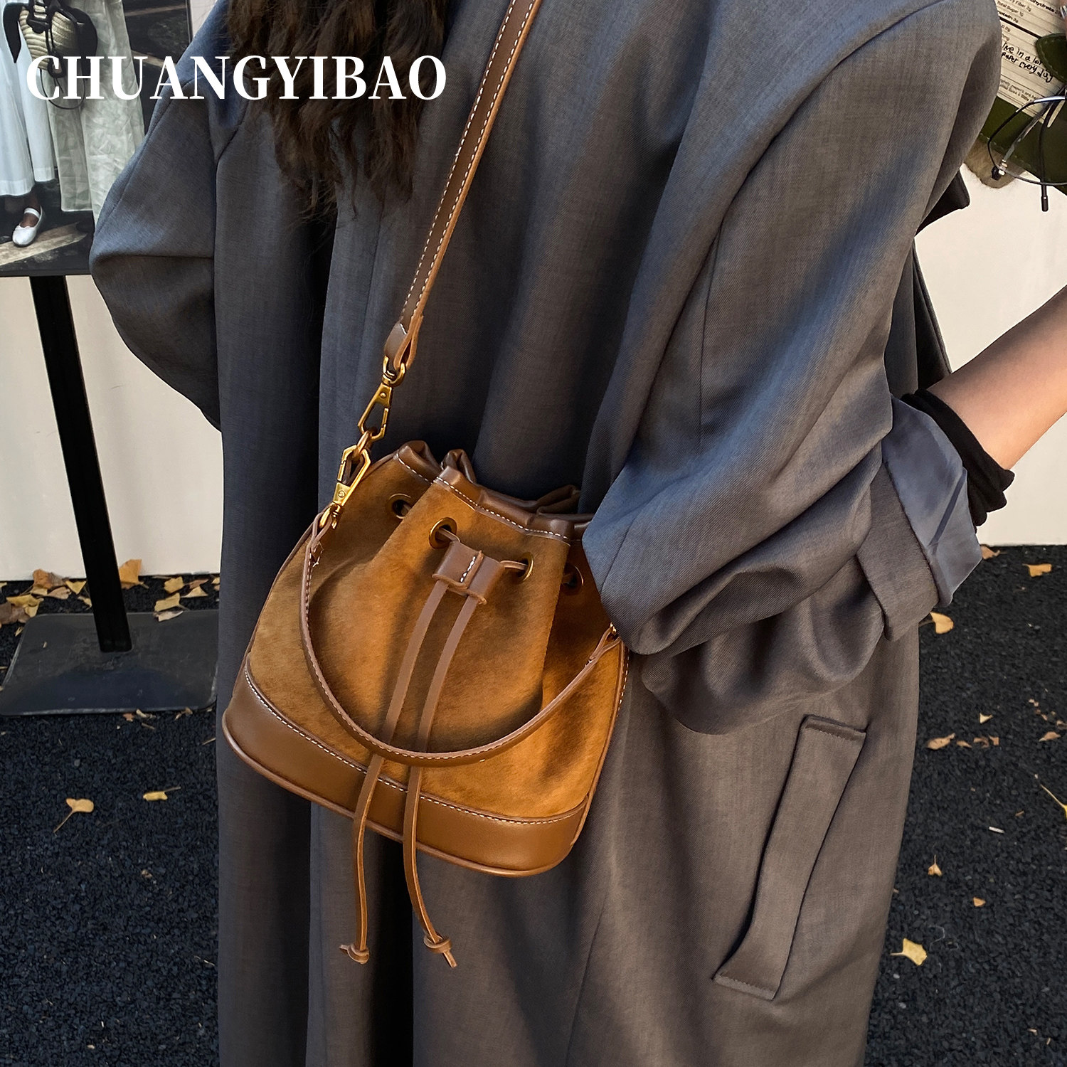 复古抽绳水桶包包女士2025新款秋冬高级感轻奢小众设计斜挎手提包,淘宝优惠券,粉丝福利购,淘宝优惠卷