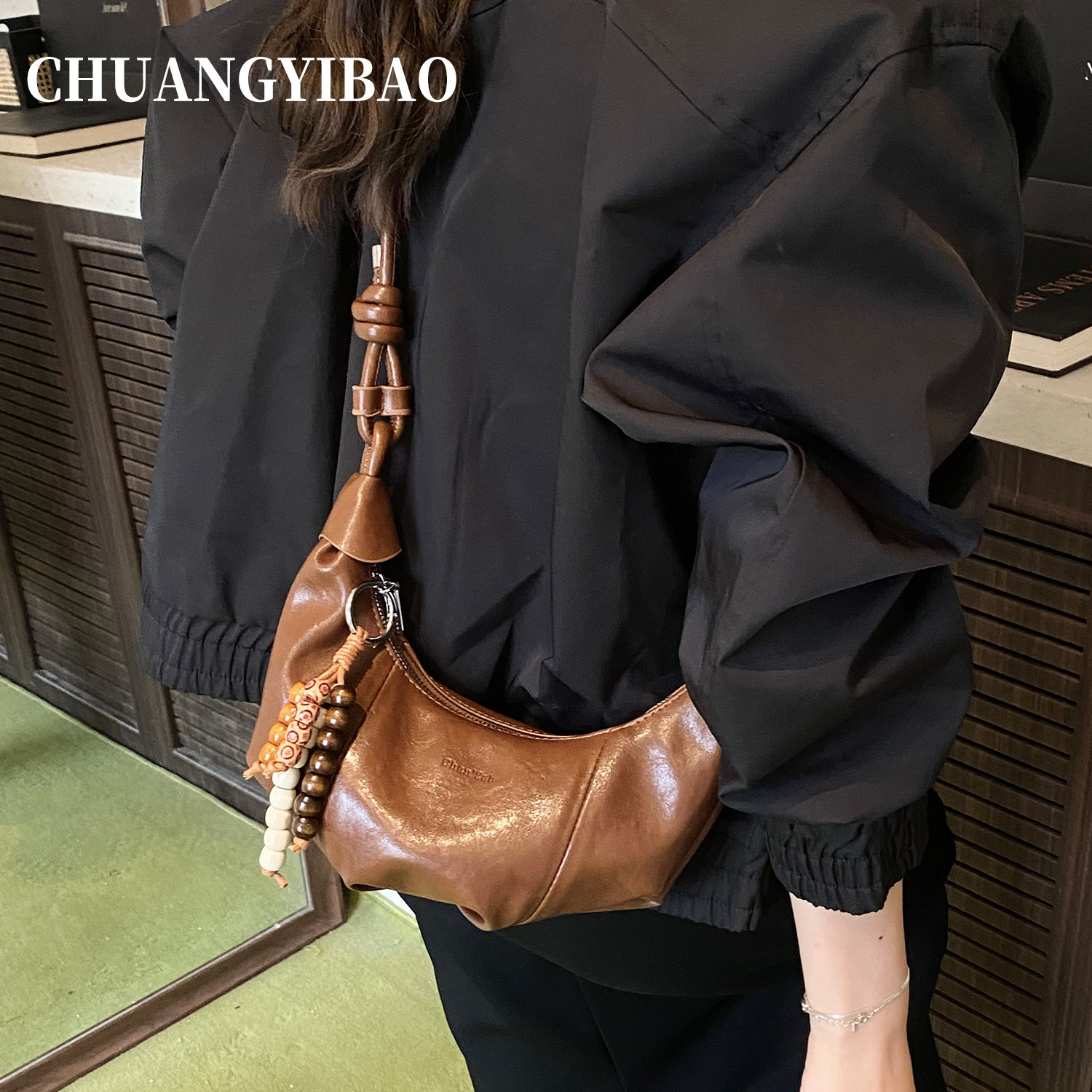 超火可颂牛角包包女式2025新款秋冬轻奢小众高级感通勤斜挎饺子包,淘宝优惠券,粉丝福利购,淘宝优惠卷