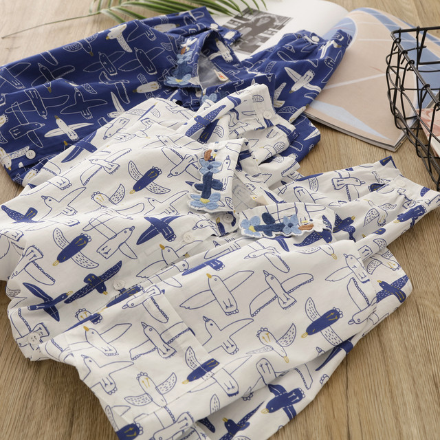 Loose artistic single-breasted long-sleeved cartoon bird print