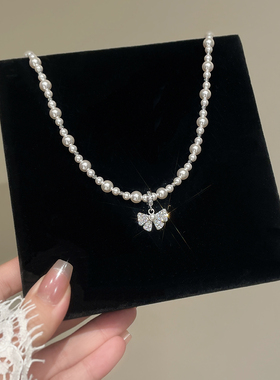 新款银色蝴蝶结珍珠吊坠项链