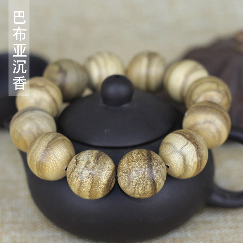 巴布亚沉香奶款奶香木手串沉香佛珠 督臣手机挂件/手机链