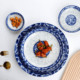 Plato de porcelana azul y blanco plato plato de cerámica para el hogar plato de arroz de color vidriado 2025 nuevo hotel vajilla plato grande comercial