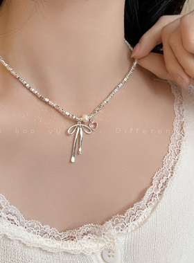 新款天然珍珠碎银子清新蝴蝶结项链女轻奢小众锁骨链粉色桃心配饰