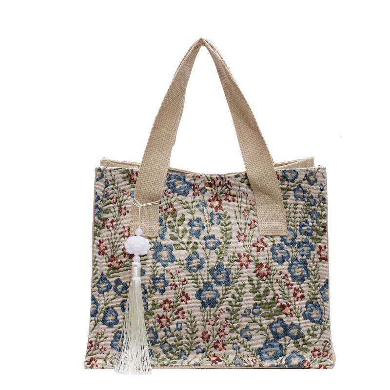 今年流行包包女2025新款麻布手提袋女ins上课通勤百搭碎花托特包,淘宝优惠券,粉丝福利购,淘宝优惠卷