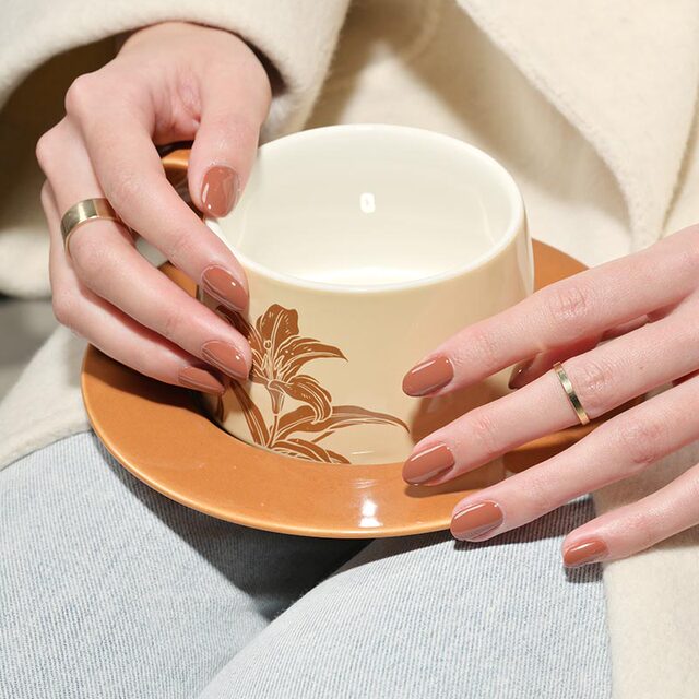 UNNA caramel pumpkin color nail polish is popular and white