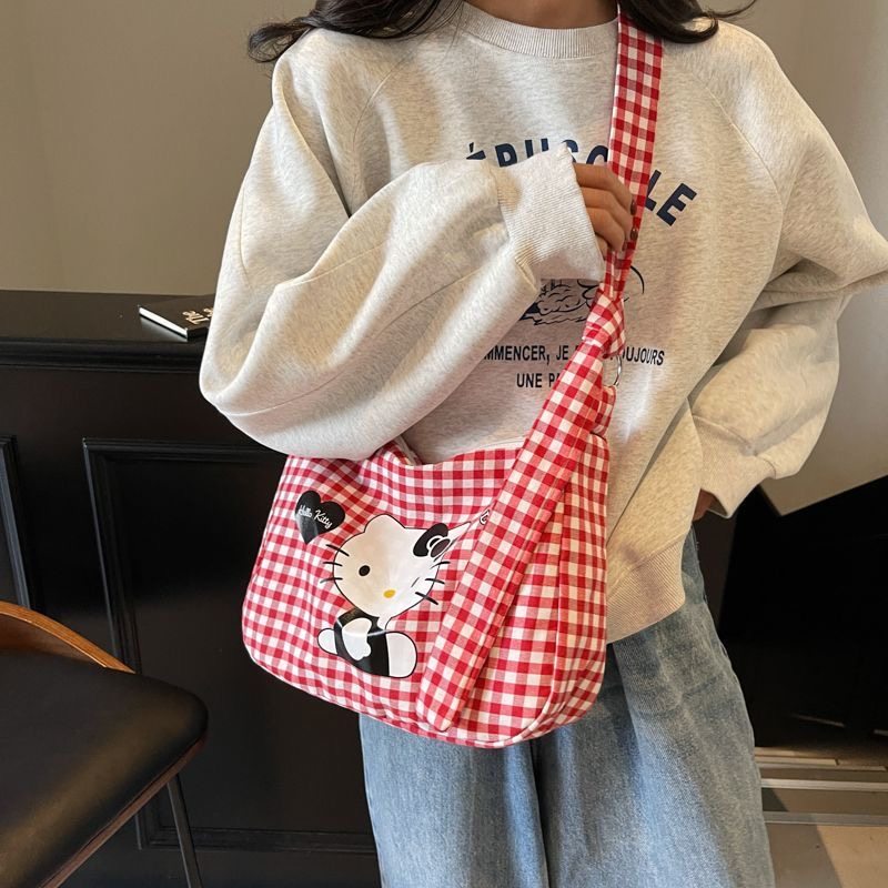 高颜值可爱hellokitty新款斜挎包女帆布包大容量格子学生上课背包,淘宝优惠券,粉丝福利购,淘宝优惠卷