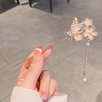 ຮູບແບບເກົ່າແກ່ pearl enamel flower tassel hairpin high-end hairpin hair net hairpin ສີແດງ Hanfu step-shaking hair accessories ສໍາລັບແມ່ຍິງ