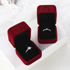 Simulated wedding rings and live props couple