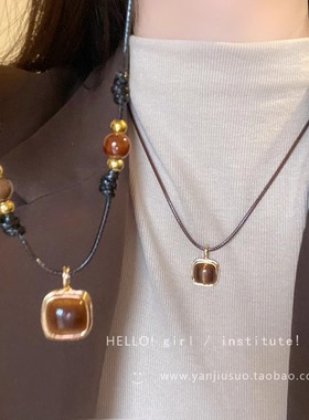 虎眼石编织皮绳项链女2024新款爆款轻奢小众高级感毛衣链叠戴配饰