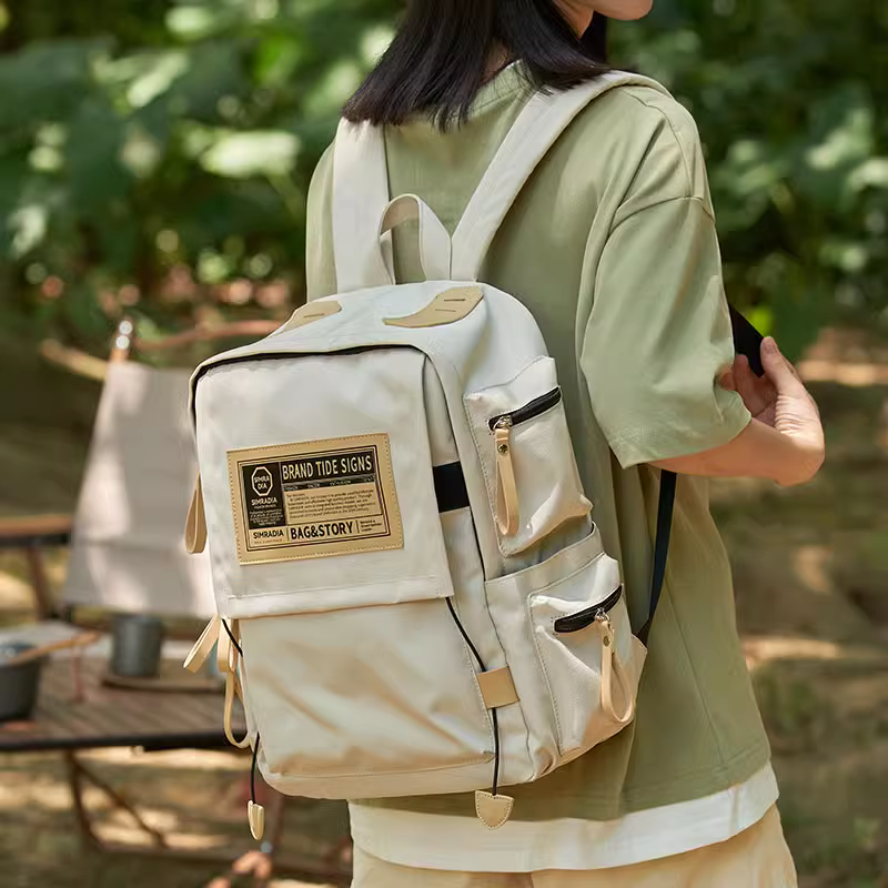 女背包大学生上班通勤短途休闲包包 雨墨双肩背包