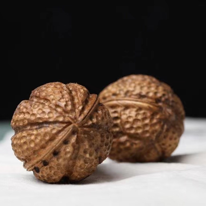 见沁巴布亚沉香核桃手把件把玩老料 见沁摆件