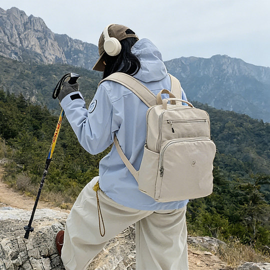 Large-capacity cloth bag women's casual backpack lightweight waterproof travel backpack commuter computer bag can be used as a trolley case