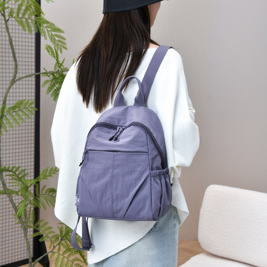 Simple and fashionable backpack women's compact nylon canvas bag travel backpack lightweight large capacity commuter mommy bag trendy