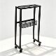 Floor-standing racket storage display rack for home use