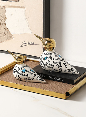 现代轻奢抽象图案金嘴雀陶瓷摆件