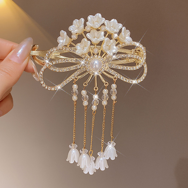 蝴蝶结流苏盘发夹女后脑勺2025新款高端扭扭一字夹高级感抓夹头饰,淘宝优惠券,粉丝福利购,淘宝优惠卷