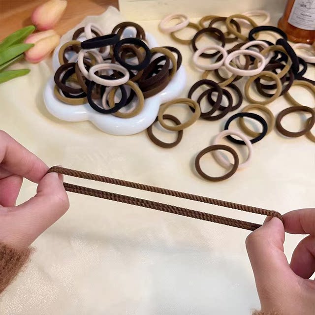 Simple rubber band women's hair tie high elastic and durable leather sheath hair rope that does not strangle hair black hair tie