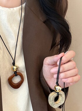 爆款琥珀叠戴金色毛衣项链女2024秋冬轻奢高级感小众虎眼石毛衣链