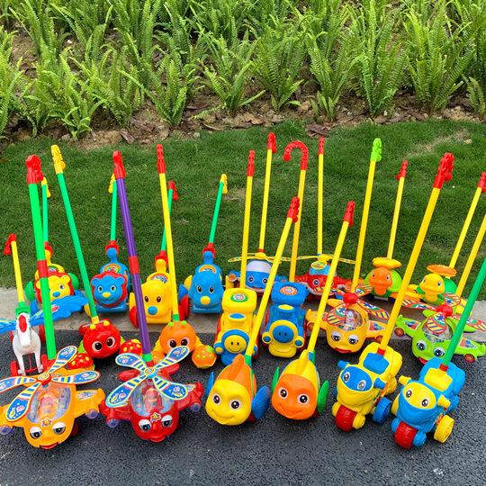 Juguete de empuje para cochecito de niño pequeño