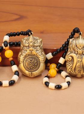 黄铜浮雕抱财貔貅转国风文