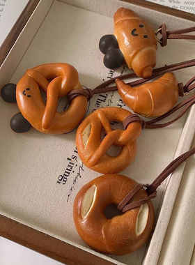 独特小众韩国挂脖毛衣链麂皮绳碱水结仿真树脂牛角包项链树脂女款