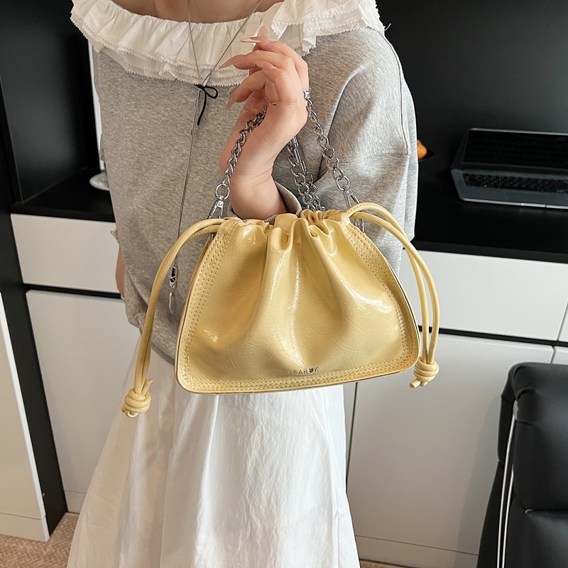 今年流行黄色包包女2025新款超火韩系水桶包大容量单肩斜挎手机包,淘宝优惠券,粉丝福利购,淘宝优惠卷