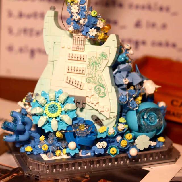 Guitar building blocks bouquet small particles girl