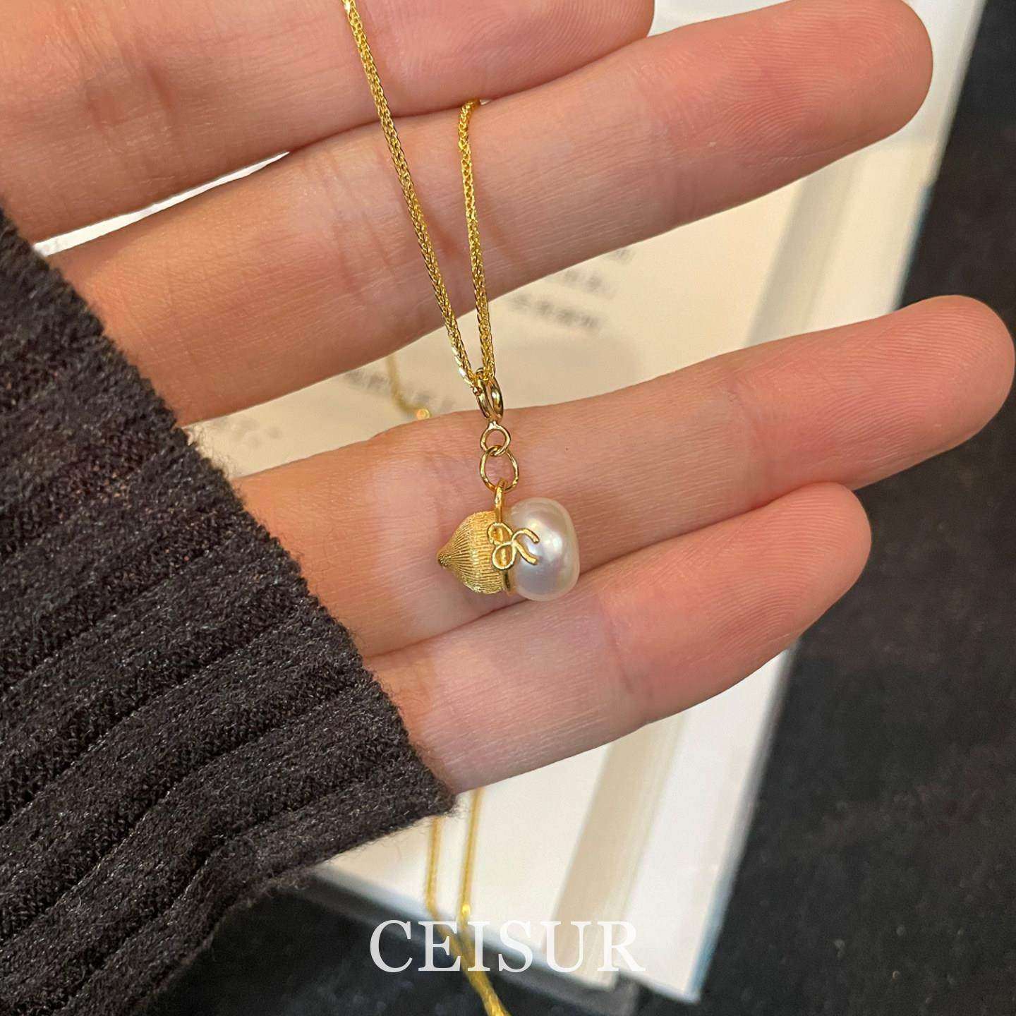 古法奶瓶蝴蝶结仿珍珠项链女款高级感轻奢小众2026新款爆款毛衣链,淘宝优惠券,粉丝福利购,淘宝优惠卷