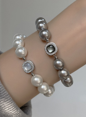 法国CoopKoop轻奢高级真多麻色白色珍珠贝母扣手链小众精致女生