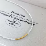 Ce Crembled Gold Baby Baby Xiaomi Beads Искусственное австралийское и белое жемчужное ожерелье 2024 Новый взрыв подлинная женская ключица S925