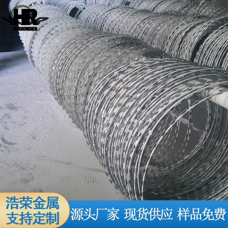 优质镀锌刀片刺丝滚笼铁路围墙蛇腹式刀片刺绳安全刺绳防护网_虎窝淘
