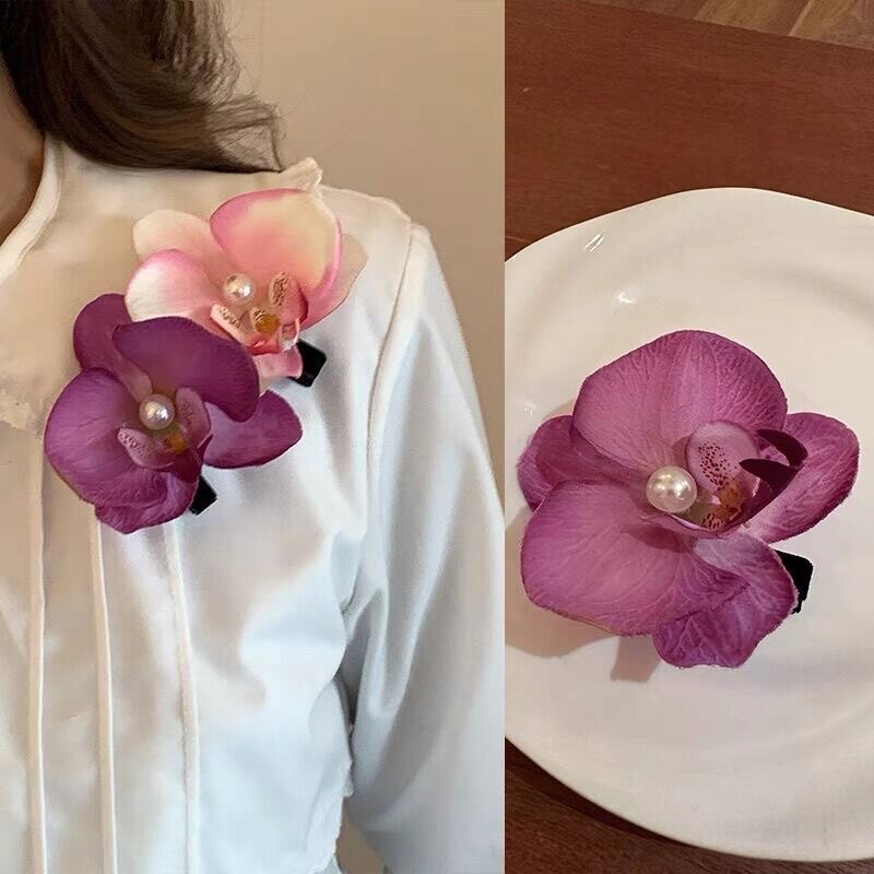 今世戴花蝴蝶结兰花朵边夹女氛围感拍照出片刘海夹海边度假头饰