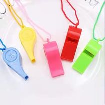 Childrens colorful toy plastic whistle cheers to help the referee match World Cup football whistleblowing