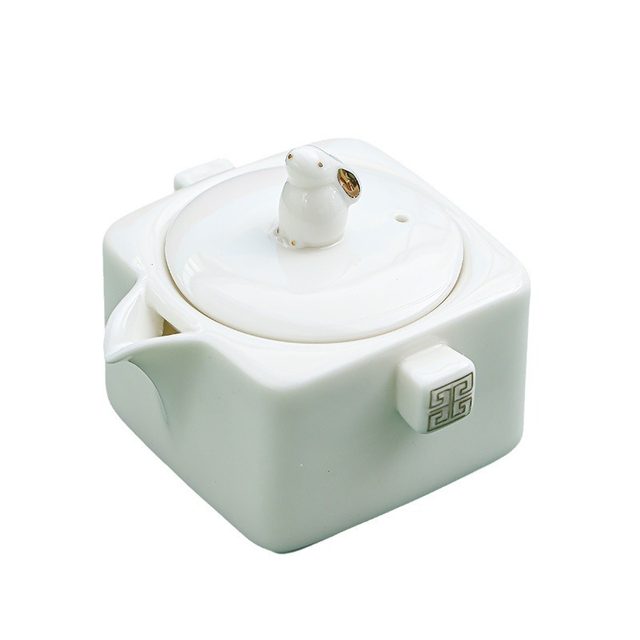 Suet-fat jade hand-grabbing pot for household high-end tea making special ceramic Kung Fu tea set tea water separation single pot 2026 new style