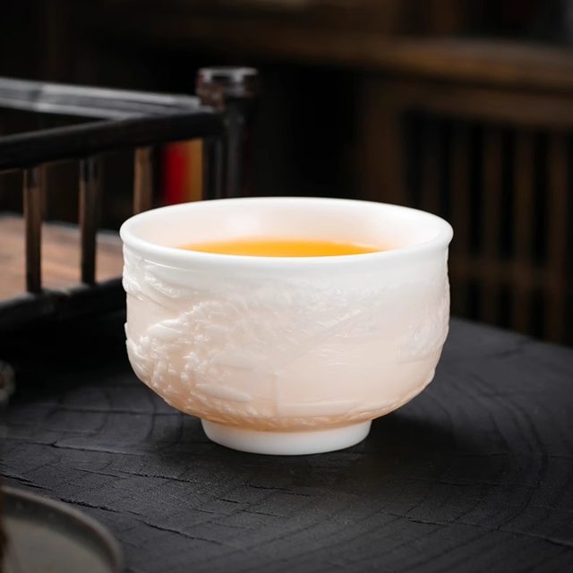 Along the River During Qingming Festival Hand-carved high-end mutton-fat jade master teacup single cup high-end ceramic kung fu tea cup