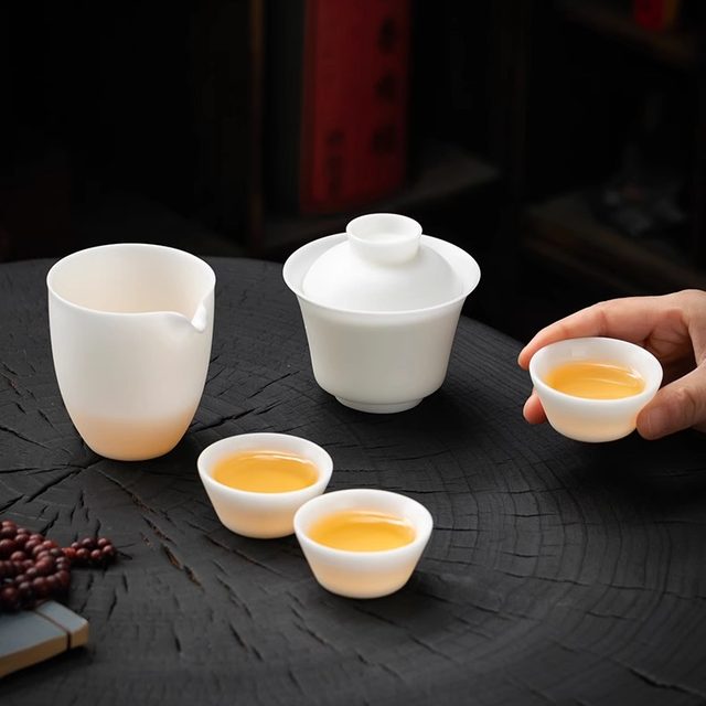 Ice-type jade porcelain quick-cup vegetarian roasted mutton fat jade porcelain cover bowl portable outdoor travel tea set one pot three cups