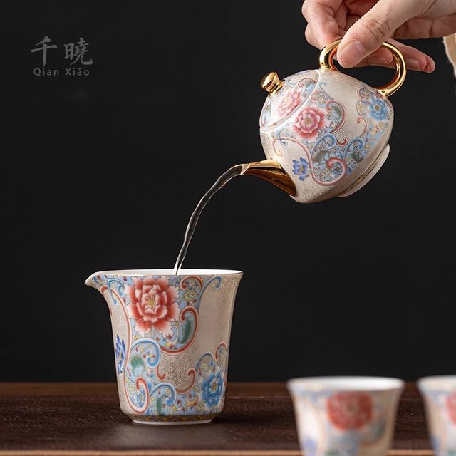 Handmade sterling silver filigree teapot and ceramic tureen