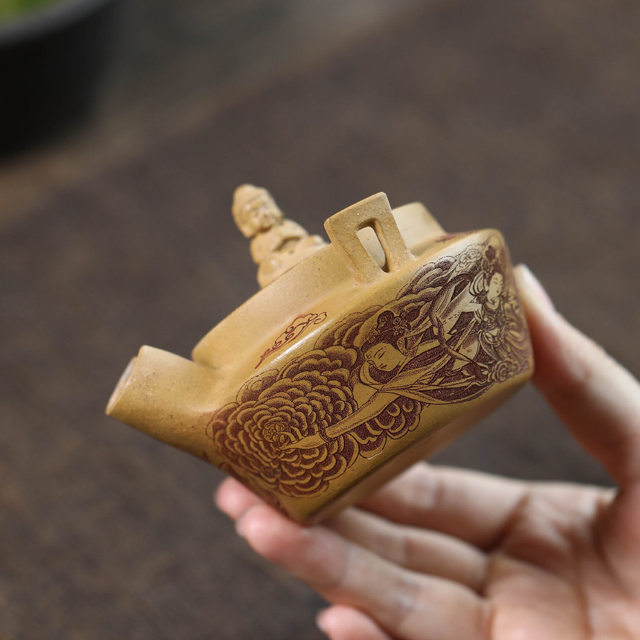 Yixing purple sand hand-engraved pot with hand-engraved images of Buddha, Guanyin and Sancai tea bowl, tea set, tea cup, single high-end