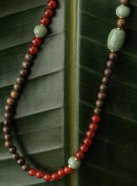 汝瓷金丝楠木红石榴手串