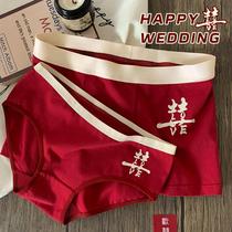 Red underwear wedding couple a couple of festive red transport men and womens underwear One man and one woman marry the same pure cotton red